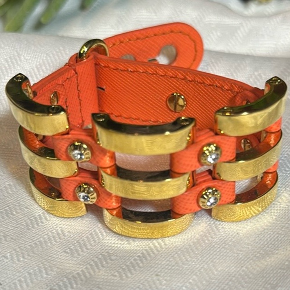 Henri Bendel bracelet Rivet Logo gold orange